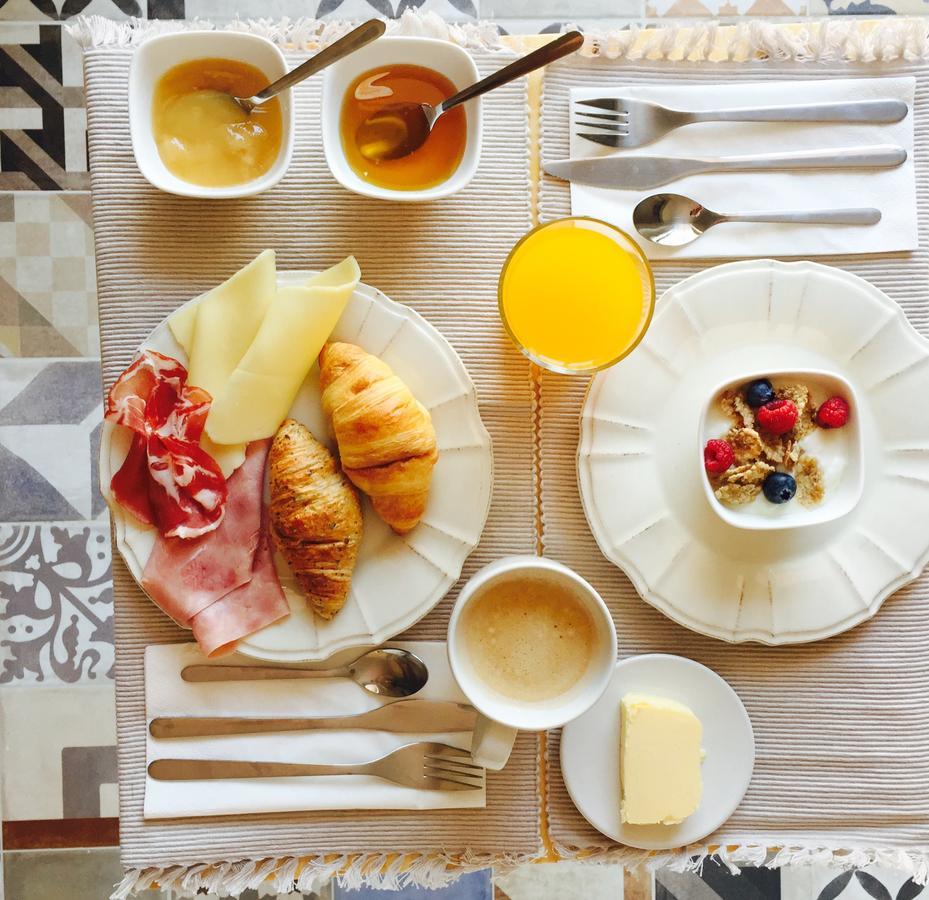 The Saints Suites Acomodação com café da manhã 